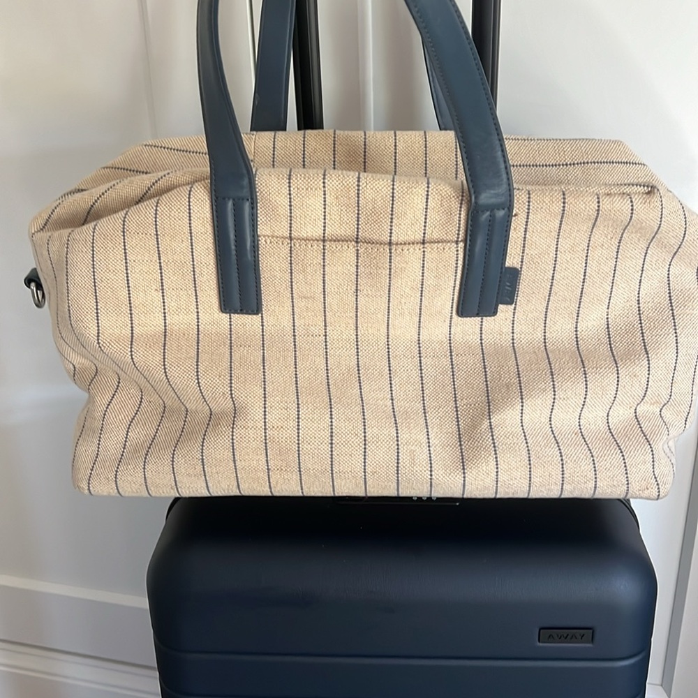 Away Beige Canvas Travel Tote with Navy Pinstripes and Navy Leather Handles